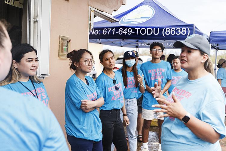 Lena Calvo Rodriguez of the Todu Guam Foundation talks to volunteers.