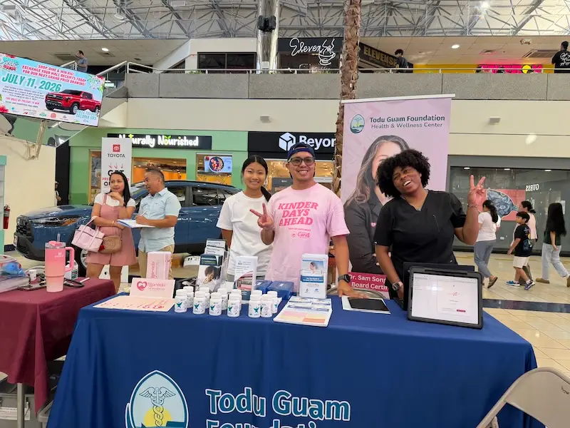 Todu Guam Foundation team at the Island Health Fair informational booth at Micronesia Mall in Guam